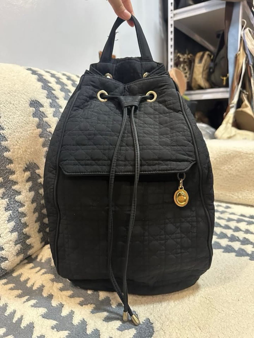 Dior Black Quilted Drawstring Backpack with Gold Charm